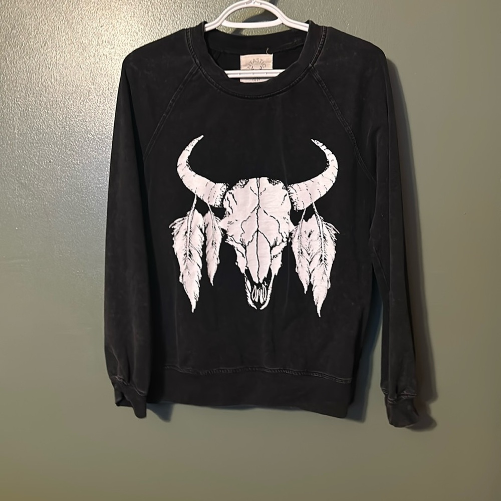Black sweater with skull on front